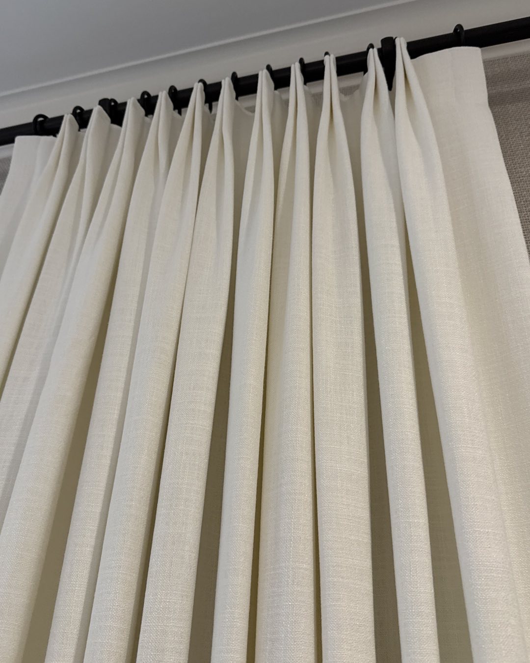 Living Room — Pale Linen Pinch Pleat Drapery